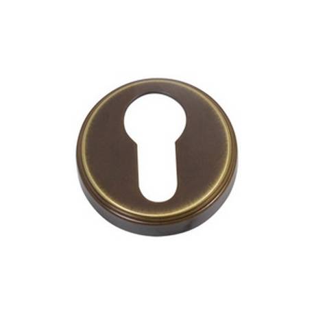 Paire de rosaces rondes clé I (BS), bronze